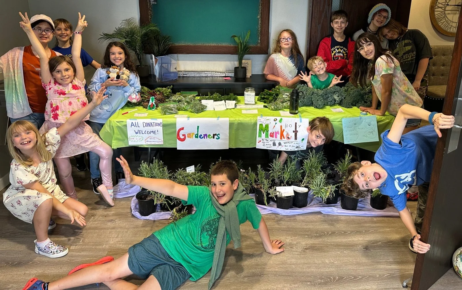 Georgetown youth at a Helping Hands community garden market